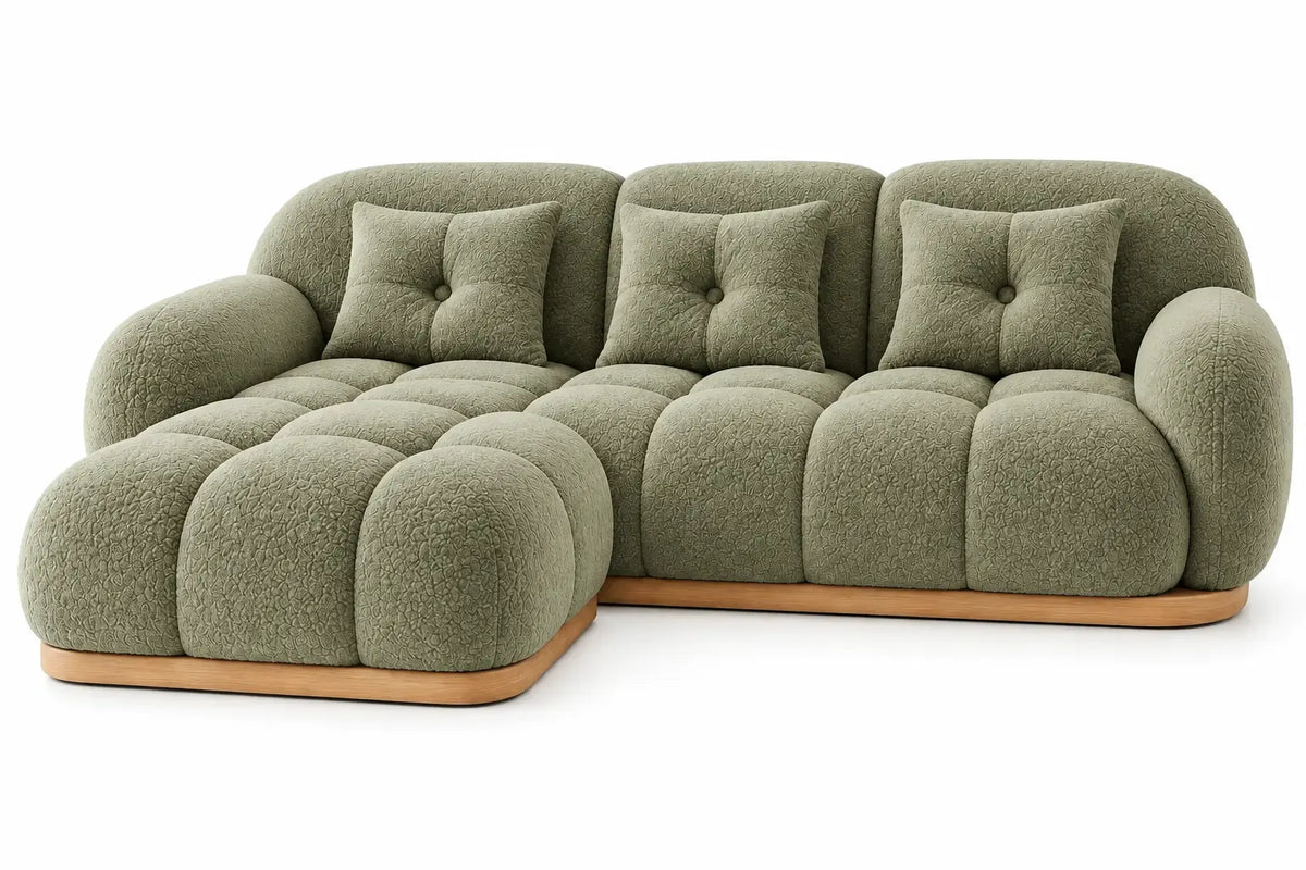 Canapé d'angle vert arrondi à assises segmentées et socle beige